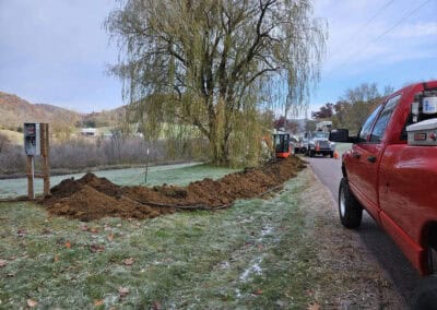 A newly dug trench for underground cabling by Olson electric